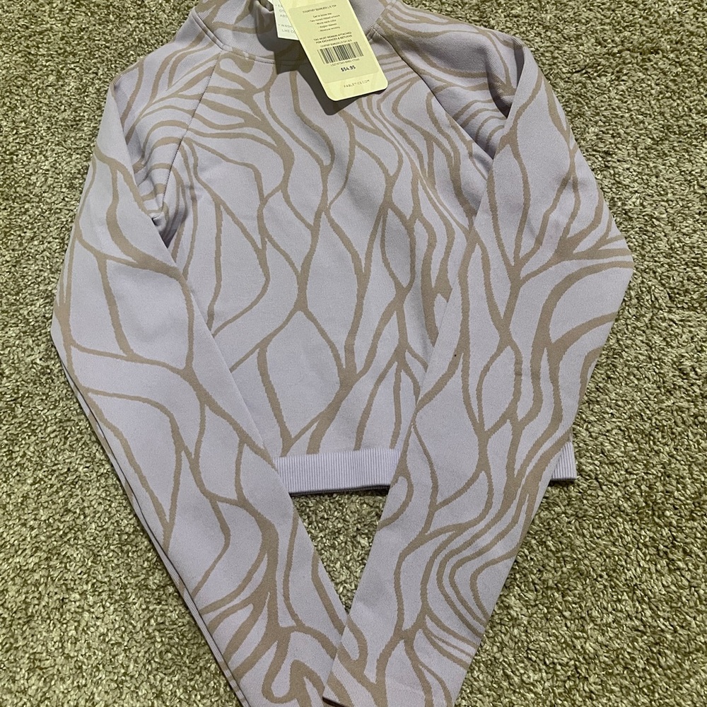 Fabletics Courtney leggings and seamless top set. Super cute.